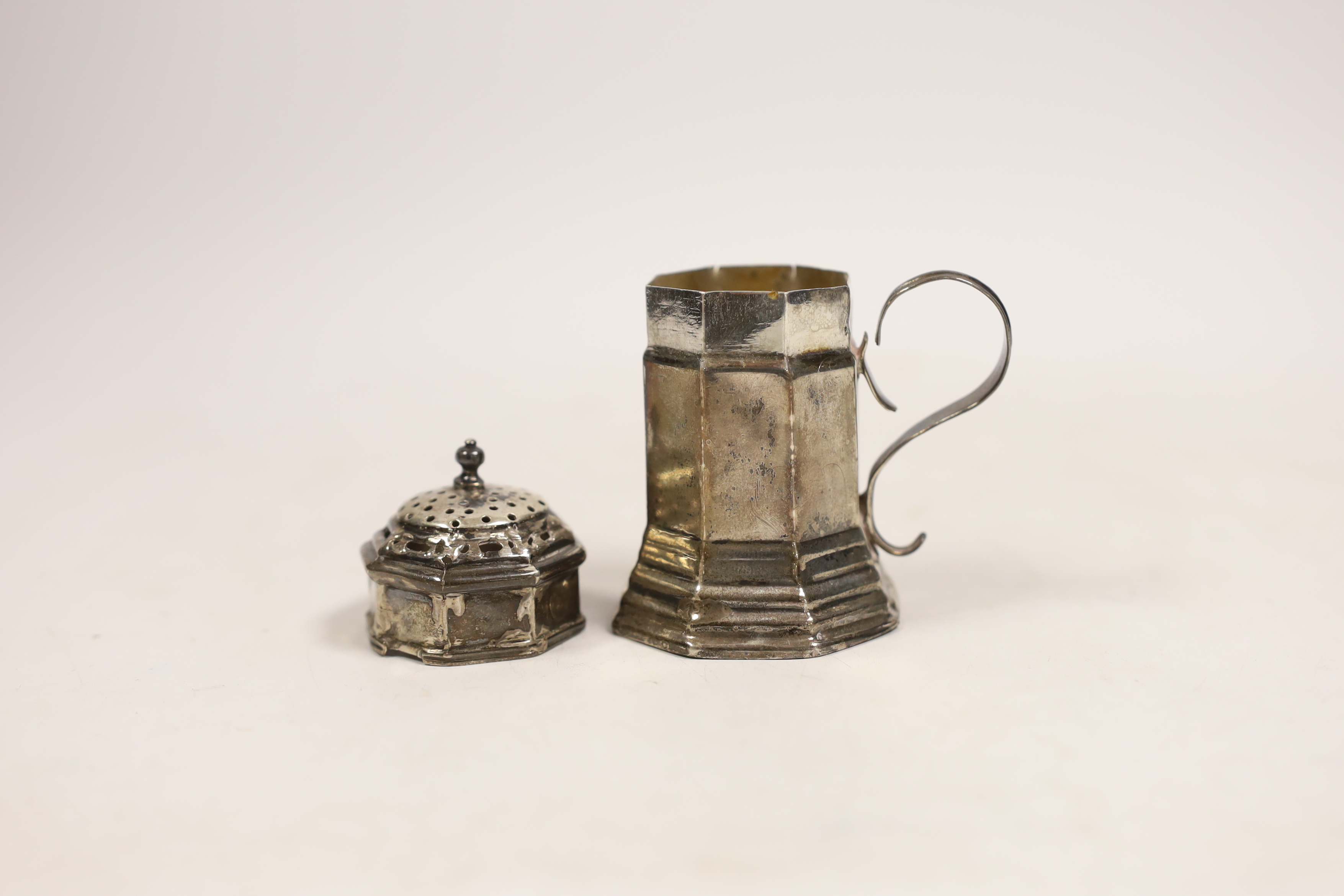 A Queen Anne silver octagonal kitchen dredger, Glover Johnson, London, 1713, 83mm(a.f.)